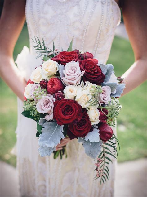 gorgeous-bridal-bouquet-cream-roses,-pastel-lavender-roses,-red-roses,-red-piano-spray-roses