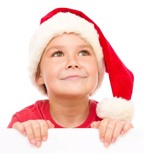 Little Girl In Santa Hat Is Holding Blank Board Stock Photo Image Of