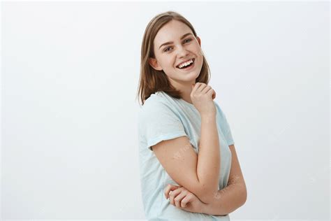 Free Photo Skillful Creative And Ambitious European Woman In Trendy T Shirt Standing In