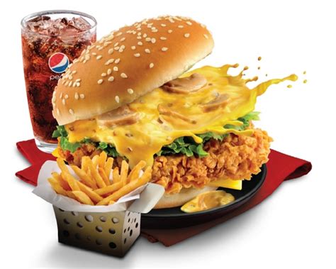 Eating their new toasted cheddar chalupa, crunchy taco supreme, nacho cheese doritos taco supreme KFC's Cheezy Mushroom Crunch