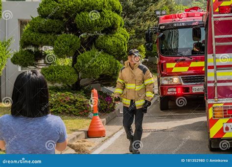 Firefighter Walking Toward Onlooker Editorial Image Image Of Hanshin
