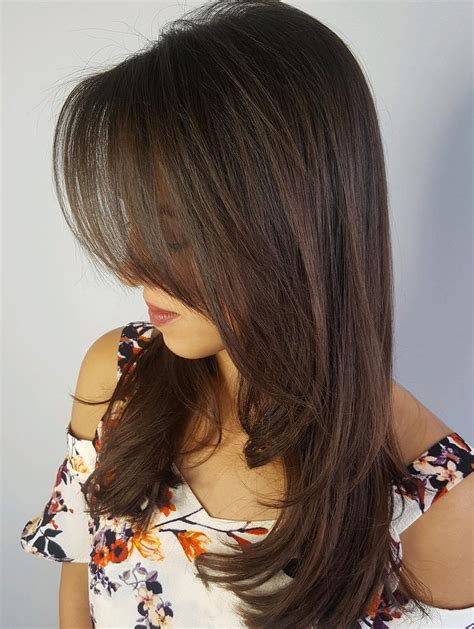 long layered haircut with bangs rockwellhairstyles