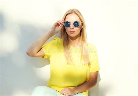 Portrait Fashion Model Woman In Sunglasses And Yellow T Shirt Stock
