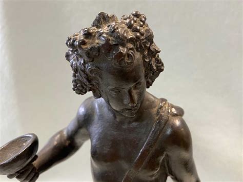 A Bronze Figure Of Bacchus After Michelangelo Probably 17th Century