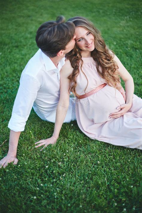 Pregnant Woman And Her Husband Walks In Park At Evening Stock Image Image Of Enjoy Expecting