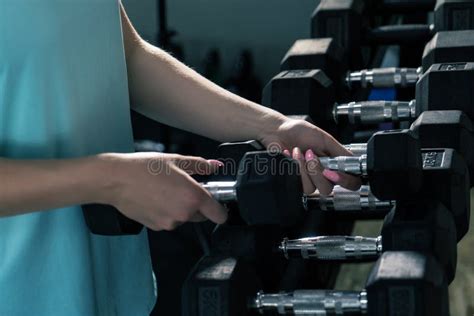 Women Using Dumbbell In Gym Stock Image Image Of Exercise Girl
