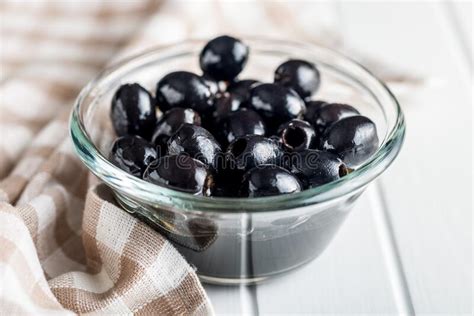 Pitted Black Olives In Bowl On Kitchen Table Stock Image Image Of