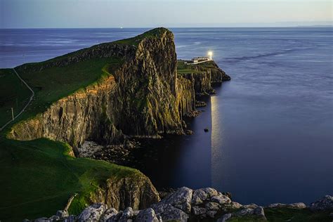 Neist Point Lighthouse In Isle Of Skye Scotland Seen At Blue Hour