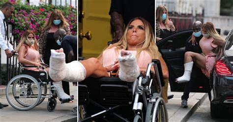 Katie Price Pictured In Wheelchair At Surgery Clinic For Broken Feet