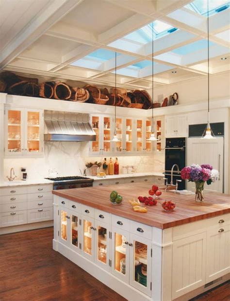 This kitchen has an illuminated star as well a large peace sign with each letter individually lit above its cabinets to create an interesting effect. 20 Stylish and Budget-friendly Ways to Decorate Above Kitchen Cabinets - Amazing DIY, Interior ...