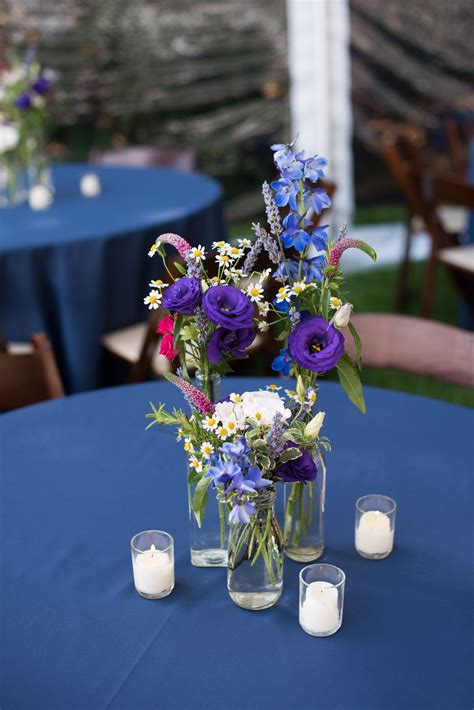 These Wildflower Centerpieces Were Perfect On The Navy Blue Linen