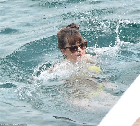 Dakota Johnson Goes Topless While Filming Racy Fifty Shades Beach Scene With Jamie Dornan And