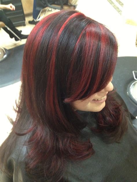 Black hair with red highlights. Highlights and lowlights for medium hair