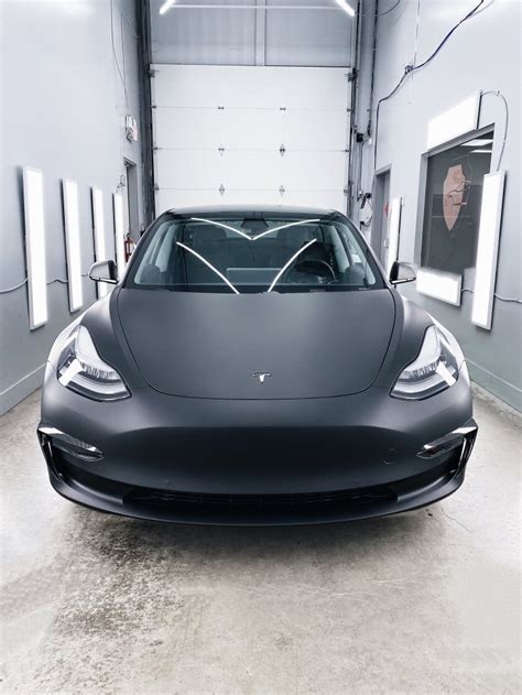 The metal structure is a combination of aluminum and steel, for maximum strength in every area. Tesla Model 3 | Matte Black Vinyl Wrap | Aegis Paint Shield
