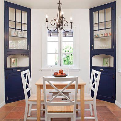 Traditional dining room chairs, glass display cabinets. Maybe an idea... Corner displays. | Corner cabinet dining ...