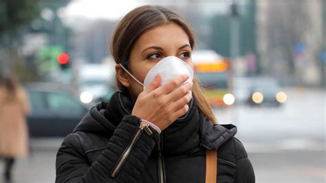 The Gross Reason Your Face Mask Smells So Bad