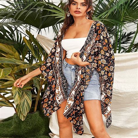 The kimono is a japanese traditional garment worn by women, men and children. Ethnic kimono with floral patterns