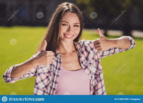 Photo Of Charming Nice Happy Woman Show Thumbs Up Education Promote Wear Plaid Shirt Outdoors In