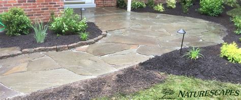 Creating An Irregular Flagstone Walkway For A Repeat Client Naturescapes