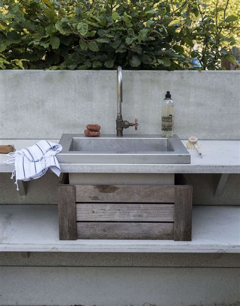 There is a sliding cover that can go over the sink area that increases your workspace. 10 Easy Pieces: Outdoor Work Sinks - Gardenista