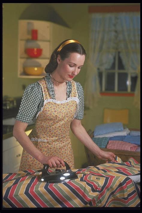 Woman Ironing In Kitchen 1948 Photograph By Archive Holdings Inc