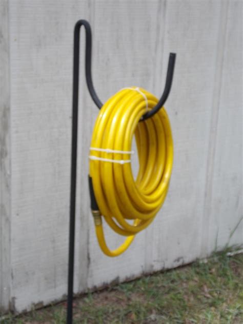 Build this diy garden hose hanger made from scrap wood for under $20.00 in less than 2 hours! NEW wrought iron look heavy duty metal garden hose holder ...