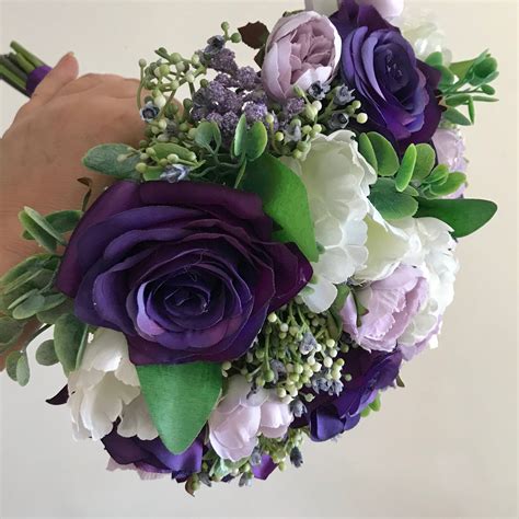 a brides bouquet of purple lilac and ivory silk roses and tulips abigailrose
