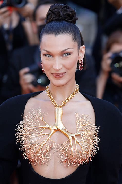 Bella Hadid Just Wore A Daring Gold Lung Dress To Cannes