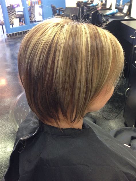 short layered bob haircut with dark caramel blonde low lights and high lights short layered bob