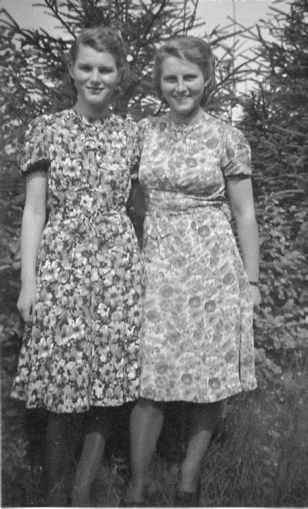 Two Younger German Women In Typical Dresses For The Era All Over