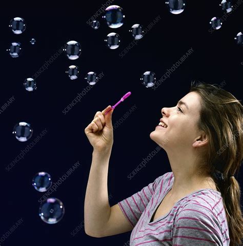 Woman Blowing Bubbles Stock Image C0010754 Science Photo Library