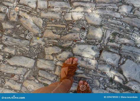 Naked Women S Feet In Sandals On The Cobblestones Cyprus Stock Photo Image Of Copy Road