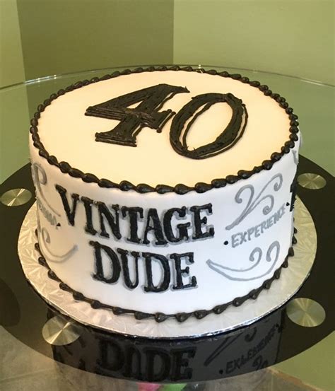 Here's a lovely 60th birthday cake in a combination of silver, black and white. Vintage Dude Layer Cake - Classy Girl Cupcakes
