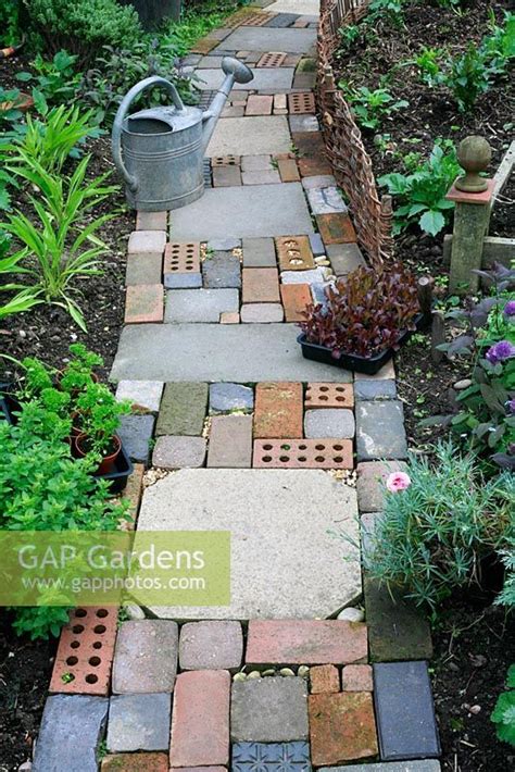 Cottage Garden Style Path Made With Salvaged Materials Including Slabs