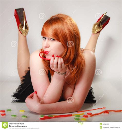 redhair girl holding sweet food jelly candy on gray stock image image of lick bonbon 46742855