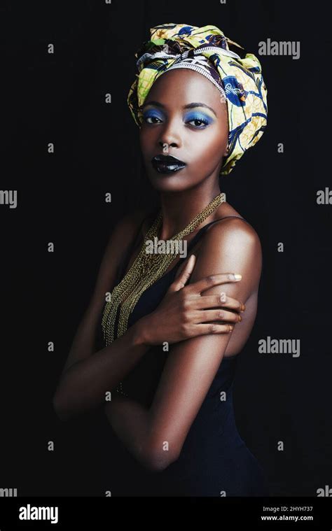 Shes A True African Beauty A Beautiful African Woman Posing Against A Black Background Stock