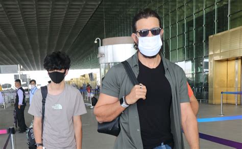watch hrithik roshan spotted at mumbai airport as he jets off with son hrehaan fans ask why