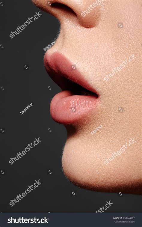 Close Up Of Womans Lips With Fashion Natural Beige Lipstick Makeup
