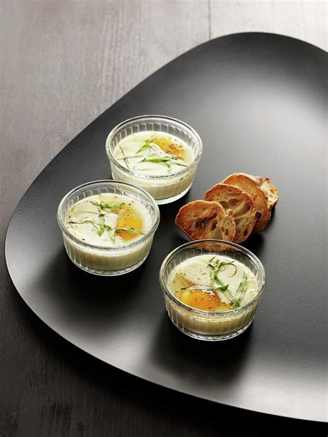 Oeufs En Cocotte Baked Eggs France With Chervil And Toasted Slices Of