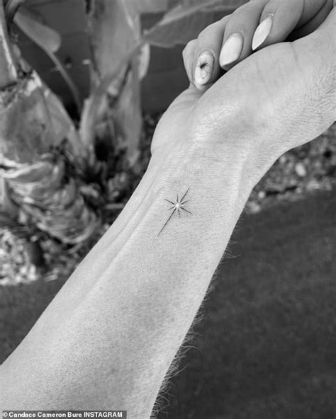 candace cameron bure shows off her new cross tattoo on the inside of her wrist wstpost