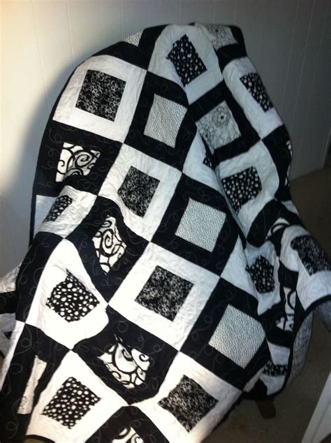 Black And White Quilt Made From 5 Squares And Bordered With 2 12