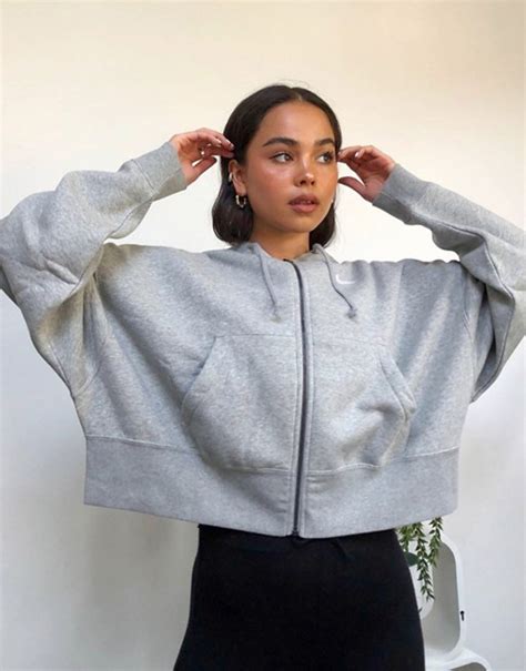 Explore versatile style with women's nike sweatshirts & hoodies, an ideal option for your casual and sports look. Nike mini swoosh oversized cropped zip through hoodie in ...