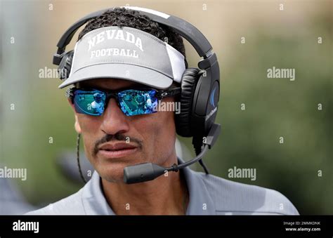 Nevada Head Coach Jay Norvell Watches From The Sideline In The First Half Of An Ncaa College