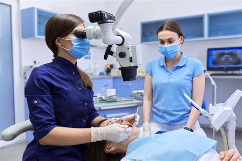 Healthcare Dentistry Medicine Woman Doctor Dentist Treats Teeth Stock