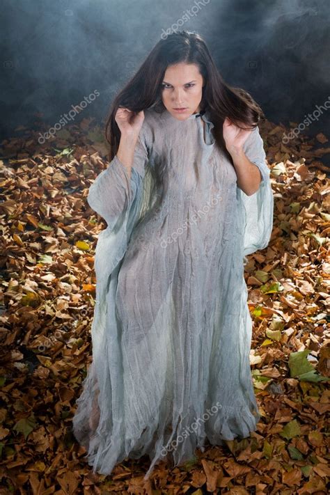 Very Sexy Witch In Halloween Gothic Style Stock Photo Wlangeveld
