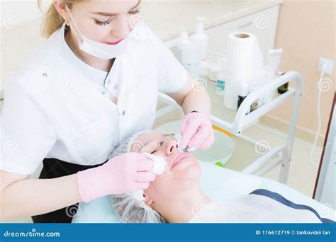 A Close Up Of The Cleaning Procedure In The Office Of Cosmetology The