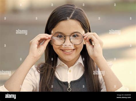 An Intellectual Look Happy Child Look Through Glasses Outdoors Vision