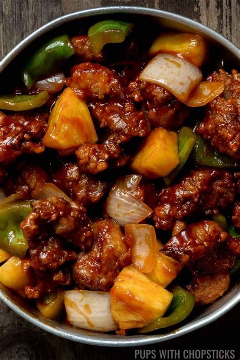 Sweet and sour pork hong kong style chunky pork pieces in delicious sweet and sour sauce. A traditional Chinese sweet and sour pork recipe (Cantonese Style) made with crispy pork ...