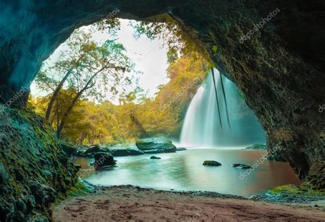 Amazing Cave In Autumn Deep Forest With Beautiful