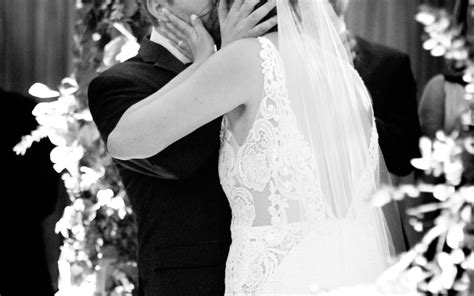 Groom Kisses Bride Araujo Photography